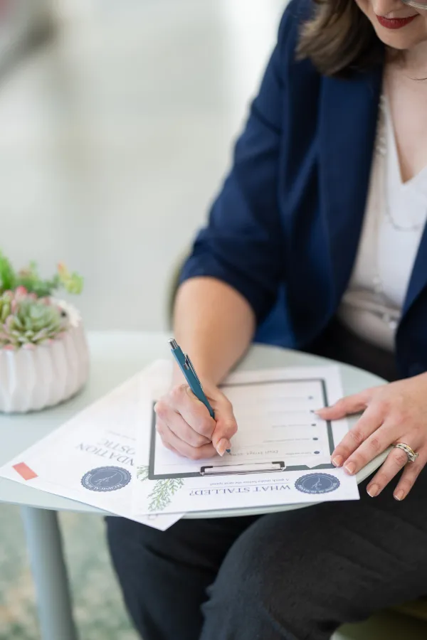 A printed worksheet and pen on a desk.